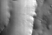 Possible Mafic Minerals Exposures on Arabia Terra Crater Wall