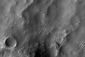 Flow Moving around Crater in Huygens Crater