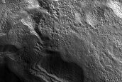 Deposits on Crater Floor in Rudaux Crater