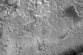 Light-Toned Deposit at Mouth of Maja Valles