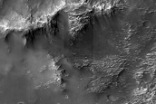 Channels Entering Crater in  Terra Sabaea