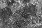 Light-Toned Deposit at Mouth of Maja Valles