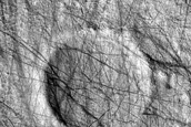 Small Crater with Ejecta in Western Peneus Patera