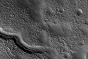 Channel and Crater in Northern Mid-Latitudes