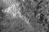 Clay-Rich Terrain Associated with Fresh Crater Ejecta on Ladon Valles Floor