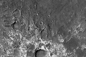 Possible Well-Exposed Overturned Terrain in Crater near Her Desher Vallis