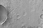Sinuous Ridge Feeding Possible Lake Deposits