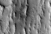 Candidate Recent Impact Site in Sacra Sulci