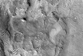 Fluvially Incised Terrain Northeast of Syrtis Major Planum