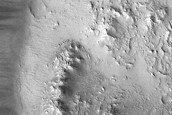 Exposed Bedrock in Terrace of Crater in Lunae Planum