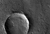Pits in Crater Ejecta North of Arabia Terra
