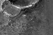 Impact-Related Flows near 6-kilometer Diameter Crater in Hadriaca Region