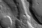 Channel and Crater in Northern Mid-Latitudes