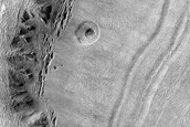 Crater with Hydration Signatures in West Hellas Planitia