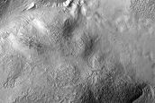 Gullies and Flow Features along Crater Wall in Eastern Hellas Region