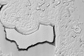 Thick Carbon Dioxide Ice Mesas