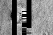 Layered Feature in Crater in Hellas Planitia