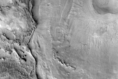 Layers in Crater Depression West of Huo Hsing Vallis