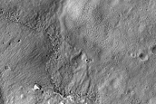 Layered Feature in Crater in Southern Mid-Latitudes