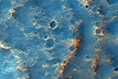 Exit Breaches in Small Low-Latitude Crater
