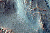 Crater with Tongue-Shaped Features on Walls