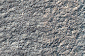 Monitoring New Small South Polar Layered Deposits Crater