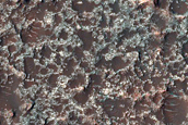 Possible Mafic Minerals on Lopez Crater Floor