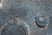 Pits and Cracks in Protonilus Mensae