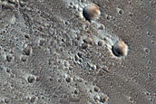 Flows and Valleys in Northern Lycus Sulci