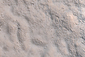 Extended Ejecta in Adamas Labyrinthus