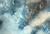 Mafic Minerals Ejected by Small Craters on Syrtis Major Planum