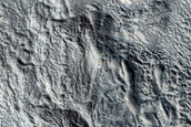 Ridges and Pits in Moreux Crater