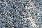Scarp and Possible Landslide Deposits in Chaos-Like Depression 