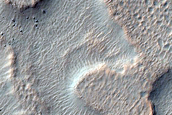 Crater Superimposed on Rim of Larger Crater