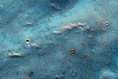 Possible Mafic Mineral Exposure on Herschel Crater Floor