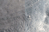 Crater on Rim of Kasei Valles