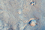 450-Meter Diameter Crater with Dark Bouldery Ejecta