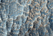 Channels in Claritas Fossae