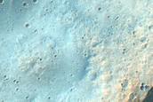 Possible Olivine Exposed by Impact Crater in Eastern Hesperia Planum