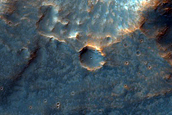 Impact Related Deposits and Flows in Tyrrhena Terra