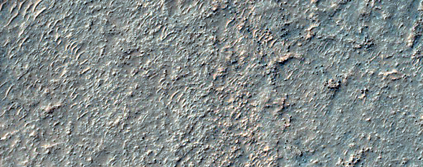 Western Rim of Slipher Crater and Terrain to South