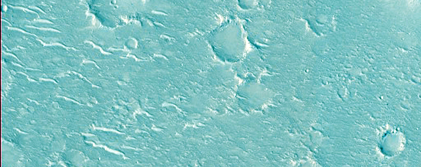 Arcuate Ridges and Pitted Cones near Hebrus Valles