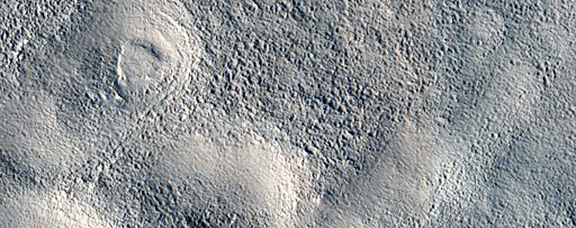 Layered Features in Depressions in Deuteronilus Mensae