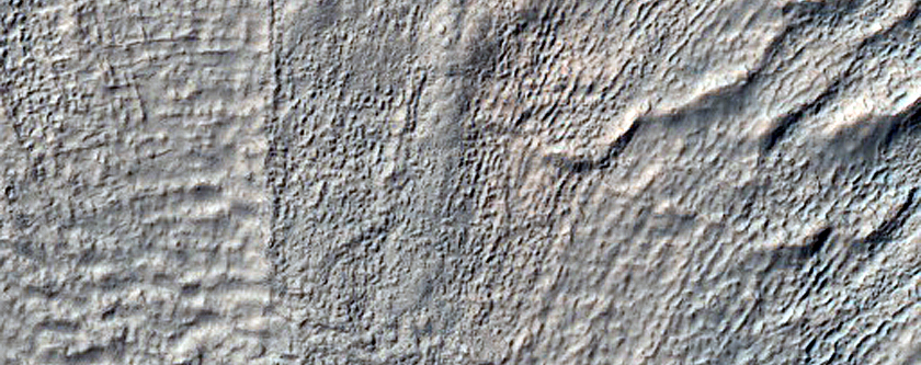 Small East and West Facing Gullies in Fresh Crater