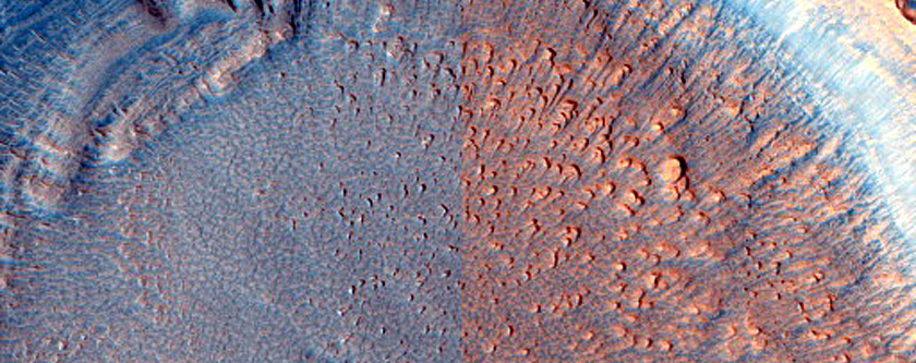 Crater with Dipping Layers South of Deuteronilus Mensae