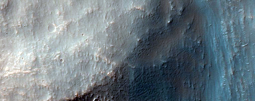 Possible Mafic Spectral Signature on Eastern Flank of Sirenum Mons