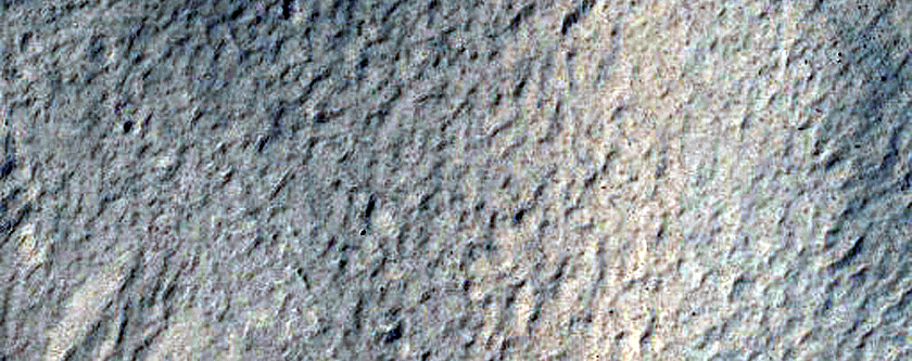 Impact Related Deposit and Flows near Karratha Crater