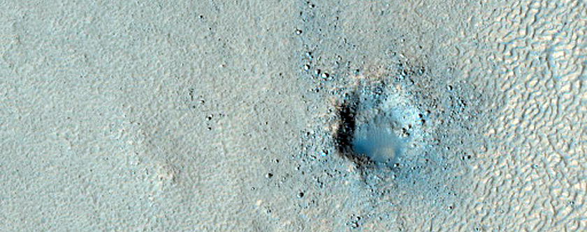 Small Crater with Fresh Looking Ejecta on Glacier