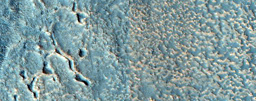 Cracks Forming Ridges and Troughs in Deuteronilus Mensae