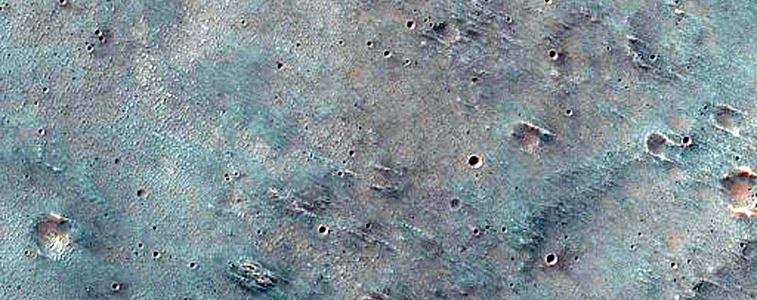 Light-Toned Deposits on Floor of Ophir Cavus